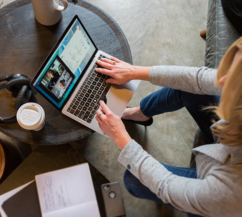 Intevity manager working remotely from a coffee shop